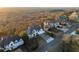 Overhead view shows large homes and a picturesque residential area, blending luxury living with natural scenery at 4349 Highborne Ne Dr, Marietta, GA 30066