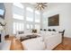 Bright and spacious living room featuring high ceilings, large windows, and stylish furnishings at 4349 Highborne Ne Dr, Marietta, GA 30066