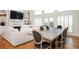 Open-concept living space with fireplace and a dining area offering ample seating at 4349 Highborne Ne Dr, Marietta, GA 30066
