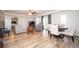 Open-concept living room with hardwood floors, lots of natural light, and a view into the bedroom at 4349 Highborne Ne Dr, Marietta, GA 30066