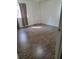 Inviting bedroom with modern floors, ample natural light, and neutral tones, creating a serene retreat at 4906 Kellys Mill Nw Dr, Lilburn, GA 30047