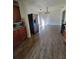 Bright eat in kitchen with modern appliances, wooden cabinetry, and sleek flooring for a contemporary culinary experience at 4906 Kellys Mill Nw Dr, Lilburn, GA 30047