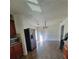 Bright eat in kitchen with modern appliances, wooden cabinetry, and sleek flooring for a contemporary culinary experience at 4906 Kellys Mill Nw Dr, Lilburn, GA 30047