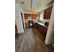 Well-equipped kitchen featuring stainless steel appliances, stylish cabinetry, and sleek flooring for modern cooking convenience at 4906 Kellys Mill Nw Dr, Lilburn, GA 30047