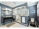 Bathroom featuring double shower, elegant vanity, and marble floors at 1923 Rugby Ave, Atlanta, GA 30337
