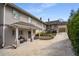 Exterior shot of a home featuring a carport, brick accents, and a well-maintained driveway at 1923 Rugby Ave, Atlanta, GA 30337