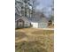 Charming single-story home with stone accents, vinyl siding and a two-car garage at 2071 Boone Pl, Snellville, GA 30078