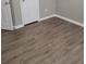Room features light grey walls, white trim, doors and luxury vinyl plank flooring at 2071 Boone Pl, Snellville, GA 30078