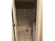 Efficient bathroom design with a toilet, shower/tub combo, and cabinet storage at 4415 Yates Rd, Atlanta, GA 30337