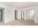 Spacious bedroom features neutral carpet, paint, a closet with mirrored doors, and ample natural light at 6437 Stone Way, Morrow, GA 30260