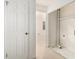 Hallway with view to additional room and open closet; great for storage and organization at 6437 Stone Way, Morrow, GA 30260