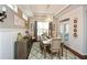 Formal dining room featuring a chandelier and large windows at 505 Appalachian Woods Dr, Canton, GA 30114