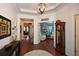 Spacious foyer with hardwood floors, stylish console table, and views of living spaces at 505 Appalachian Woods Dr, Canton, GA 30114