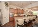 Gourmet kitchen featuring a large island with seating and modern light fixtures at 505 Appalachian Woods Dr, Canton, GA 30114