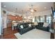 Open concept living room with hardwood floors, recessed lights, ceiling fan, and access to the kitchen at 505 Appalachian Woods Dr, Canton, GA 30114