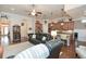 Open concept living room with hardwood floors, recessed lighting, and access to the kitchen at 505 Appalachian Woods Dr, Canton, GA 30114
