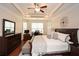 Alternate view of the main bedroom; highlights the large dresser, windows and tray ceiling at 505 Appalachian Woods Dr, Canton, GA 30114