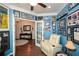 Office with New York Yankees decor, hardwood floors, and a french door at 505 Appalachian Woods Dr, Canton, GA 30114