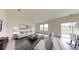 Spacious living room filled with natural light, perfect for relaxing and entertaining guests at 7728 Sudbury Cir, Covington, GA 30014