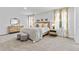 Serene main bedroom with plush carpet, soft lighting, and elegant furnishings, creating a relaxing retreat at 1645 Fuma Leaf Way, Mcdonough, GA 30253