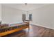 The cozy bedroom offers natural light and hardwood floors at 3130 Caney Creek Ln, Cumming, GA 30041