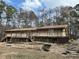 Expansive wooden deck, perfect for outdoor entertaining and relaxation at 8395 Atlanta Newnan Rd, Chattahoochee Hills, GA 30268