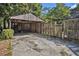 View of a carport and wooden privacy fence at 1200 Dekalb Ave, Atlanta, GA 30307