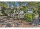 Street view of a quaint home with mature trees at 1200 Dekalb Ave, Atlanta, GA 30307