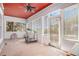 Sunroom with carpet, fan, exercise equipment, and floor to ceiling windows providing abundant natural light at 1200 Dekalb Ave, Atlanta, GA 30307