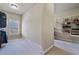 Walk-in closet featuring open shelving and plenty of space for clothes and accessories at 13029 Dartmore Ave, Alpharetta, GA 30005