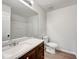 Neutral bathroom with modern vanity, updated fixtures, and a shower-tub combination at 2399 Coach Way, Jonesboro, GA 30236