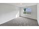 Bright bedroom featuring a large window, offering a view of the outdoors at 2399 Coach Way, Jonesboro, GA 30236