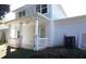 Back porch of home, featuring white trim and railings and lots of natural light at 2414 Rose Palm Pl, Atlanta, GA 30315