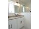 The primary bathroom features double sinks with granite countertops, modern fixtures, and ample mirror space at 2414 Rose Palm Pl, Atlanta, GA 30315