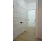 Inviting hallway with a closet featuring double doors and bright neutral tones and finishes at 2414 Rose Palm Pl, Atlanta, GA 30315