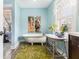 Charming bathroom with a clawfoot tub, light blue walls, and vintage decor at 135 E Hill St # 24, Decatur, GA 30030