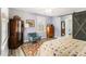 Spacious bedroom featuring wood-look flooring and a barn door leading to the ensuite bathroom at 135 E Hill St # 24, Decatur, GA 30030