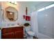 Bright bathroom with a tub, a shower, a vanity, and neutral tilework at 2392 Ivy Mountain Dr, Snellville, GA 30078