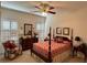 Well-furnished bedroom with a four-poster bed and stylish decor at 2392 Ivy Mountain Dr, Snellville, GA 30078
