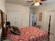 Comfortable bedroom with four-poster bed and closet space at 2392 Ivy Mountain Dr, Snellville, GA 30078