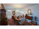 Formal dining room with hardwood floors, traditional decor, and natural light at 2392 Ivy Mountain Dr, Snellville, GA 30078