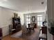 Spacious dining area with hardwood floors, classic decor, and ample natural light at 2392 Ivy Mountain Dr, Snellville, GA 30078