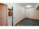 Garage features multiple white doors and cabinets for ample storage space at 2392 Ivy Mountain Dr, Snellville, GA 30078