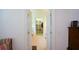 Open hallway that leads to an organized walk-in closet, offering ample storage at 2392 Ivy Mountain Dr, Snellville, GA 30078