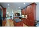Modern kitchen with an island, granite countertops, and stainless steel appliances at 2392 Ivy Mountain Dr, Snellville, GA 30078