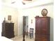 Main bedroom with tray ceiling and wood furniture at 2392 Ivy Mountain Dr, Snellville, GA 30078