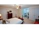 Large primary bedroom, ceiling fan, with sitting area and multiple closets at 2392 Ivy Mountain Dr, Snellville, GA 30078