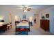 Spacious main bedroom with neutral decor and ample natural light from multiple doorways at 2392 Ivy Mountain Dr, Snellville, GA 30078