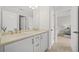 Bright bathroom with dual sinks and a view into a bedroom at 2431 Valhalla Ne Dr, Atlanta, GA 30345