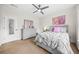 Well-lit bedroom with contemporary decor, soft carpet, and gray furniture at 2431 Valhalla Ne Dr, Atlanta, GA 30345